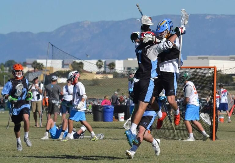 Beau Pederson celebrating a goal for 212 Lacrosse