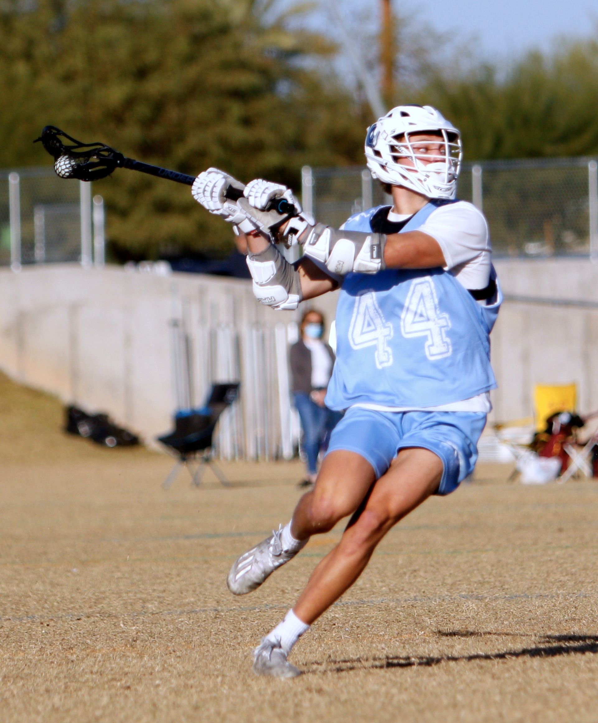 Blaze Degracie shooting on the run for 212 Lacrosse